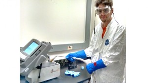Lab Technician Trevor Martin demonstrates the use of the liquid nitrogen ball mill.